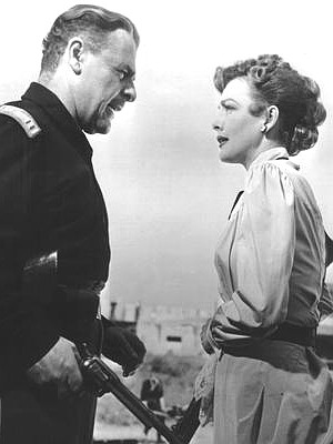 Brian Donlevy as Capt. Dempster and Virginia Grey as Lorabelle Larkin in Slaughter Trail (1951)