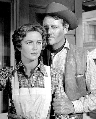 Dorothy Malone as Deborah Miller and Joel McCrea as Kip Davis in South of St. Louis (1949)