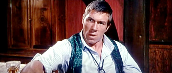 Dan Vadis as Riggs, planning treachery at Fort Yuma in Fort Yuma Gold (1966)