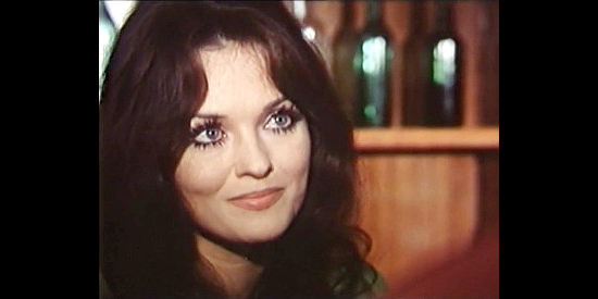 Femi Benussi as Connie, a saloon girl who welcomes strangers with a smile in Finders Killers (1971)