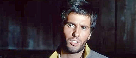 Giuliano Gemma (Montgomery Wood) as Gary Hammond, asked to help prevent a slaughter in Fort Yuma Gold (1966)