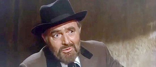James Mason as Francisco Montero, Alicia's other husband, in Bad Man's River (1971)