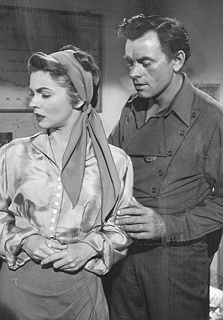 Joanne Dru as Hallie McLaird and John Ireland as Marshal Sam Rochelle in Hannah Lee (1953)