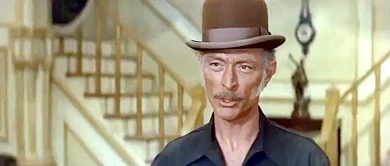 Lee Van Cleef as King, dealing with a revolution, a conniving woman and an elusive fortune in Bad Man's River (1971)