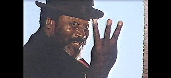 Leroy Haynes as Marquis, the man who works for the Frenchie King girls in The Legend of Frenchie King (1971)