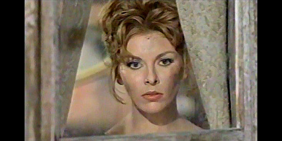 Lorendana Nusciak as Maria, a woman growing numb to all the violence around her in Django (1966)