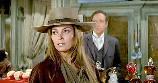 Raquel Welch as Hannie Caulder has her shopping interrupted by a Clemens brother in Hannie Caulder (1971)