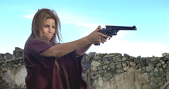 Raquel Welch as Hannie Caulder tries her hand with a gun in Hannie Caulder (1971)