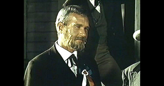 Reginald Gilliam as Dr. Carter, one of the three men who raised Joe Navak, in Christmas Kid (1967)