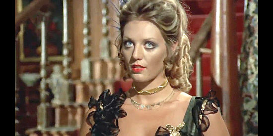 Simone Blondell (Simentetta Vitelli) as Fanny, Flanagan's girl in His Name was Sam Walbash, But They Called HIm Amen (1971)