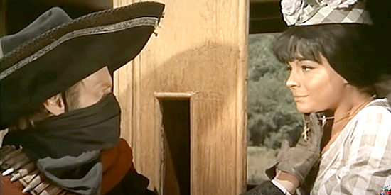 William Berger as El Cisco (Larry) encounters Maria (Antonella Murgia) during a stage holdup in El Cisco (1966)