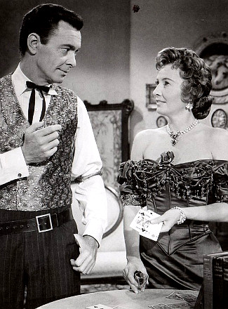 Barry Sullivan as Jeff Younger and Barbara Stanwyck as Kit Banion in The Maverick Queen (1956)