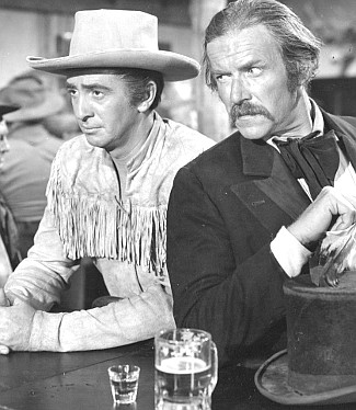 Macdonald Carey as James Bowie with Will Geer as Daniel Seeger in Comanche Territory (1950)