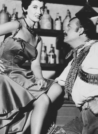 Margia Dean as Julie and Rodolfo Hoyos Jr. as Pancho Villa in Villa! (1958)