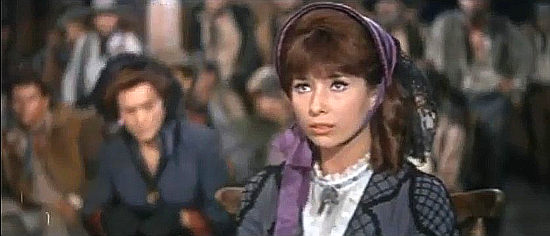 Dina Loy as Rita, testifying to her faith in Sam's innocence in The Relentless Four (1965)