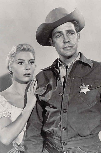 Rosanna Rory as Maria and Dale Robertson as Caleb Whales in Hell Canyon Outlaws (1957)