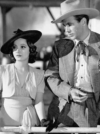 Merle Oberson as Mary Smith and Gary Cooper as Stretch Willoughby in The Cowboy and the Lady (1938)