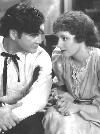 Richard Dix as Yancey Cravet and Irene Dunne as Sabra Cravet in Cimarron (1931)