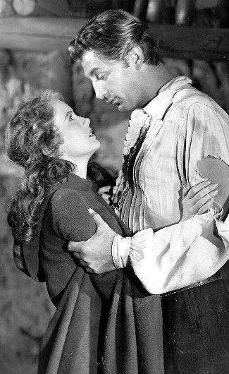 Teresa Wright as Thorley Callum and Robert Mitchum as Jeb Rand in Pursued (1947)