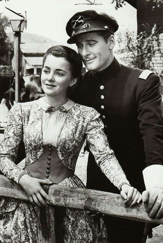 Oliva de Havilland as Kit Carson Holliday and Errol Flynn as Jeb Stuart in Sante Fe Trail (1940)