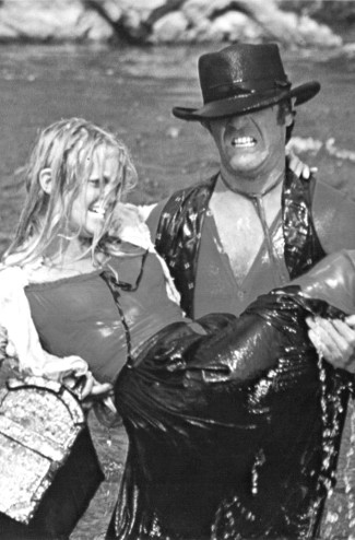 A satchel of cash, Goldie Hawn as Bluebird and George Segal as Charlie Malloy in The Duchess and the Dirtwater Fox (1976)