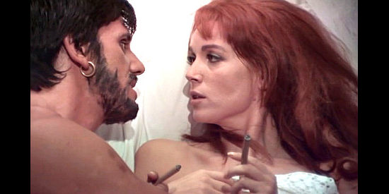 George Eastman as Larry Blackie and Elsa Martinelli as Belle, trading post-coital insults in The Belle Starr Story (1968)