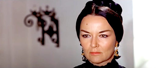 Linda Sini as Dona Sol Gutierrez, reluctantly going along with her husband's plan in The Longest Hunt (1968)