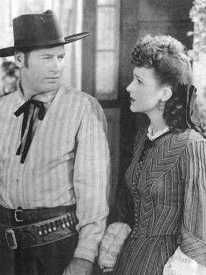 Richard Arlen as Jed Kilton and Lynne Roberts as Judy Parker in The Big Bonanza (1944)