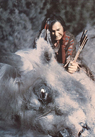 Will Sampson as Crazy Horse trying to kill the massive white buffalo in White Buffalo (1977)