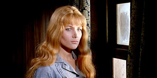 Anne-Marie Balin as Anna Rogers, kidnapped and wondering what happens next in Cemetery Without Crosses (1969)