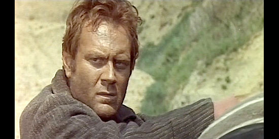 Ettore Manni as Ted Hunter, saved from the hangman's noose, in Bury Them Deep (1968) 