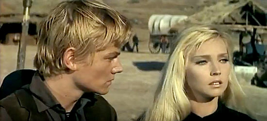 Peter Lee Lawrence as Billy and Dyanik Zurakowska as Helen Tunstill face a decision in A Few Bullets More (1967)