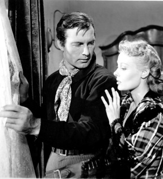 George Montgomery as Jack McCall and Angela Stevens as Rose Griffith in Jack McCall, Desperado (1954)