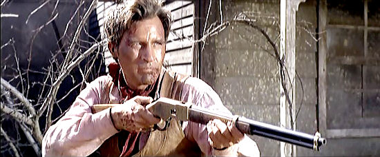 Larry Ward as Benny Hudson, proving he doesn't have to wear a gun to be good at using one in Kill the Wicked (1968)