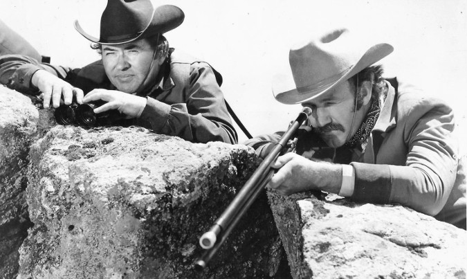 Simon Oakland as Matthew Gunn and Gene Hackman as Brandt Ruger in The Hunting Party (1971)