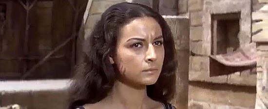 Angelica Ott as Manuela Holt in $1,000 on the Black (1966)