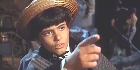 Marco Stefanelli as Tom Murphy, the young boy who idolizes Gary McGuire and seeks his help in Gunman Sent by God (1969)
