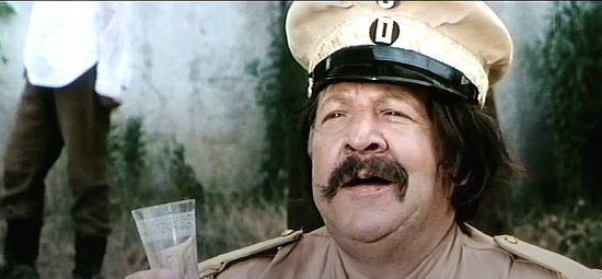 Fernando Sancho as Col. Hotshoto in Where the Bullets Fly (1972)