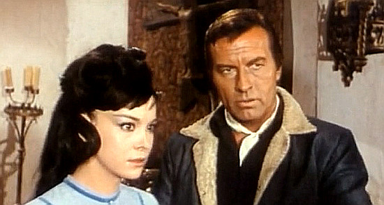 Elisa Montes as Francisca Riano and George Montgomery as Reese O'Brien in Outlaw of Red River (1965)