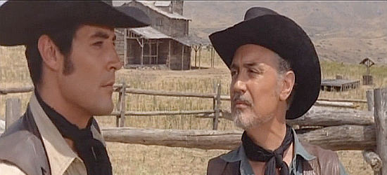 Carlos Quiney as Dale Bryce with rancher Terry Morse in Bullets Over Dallas (1970)