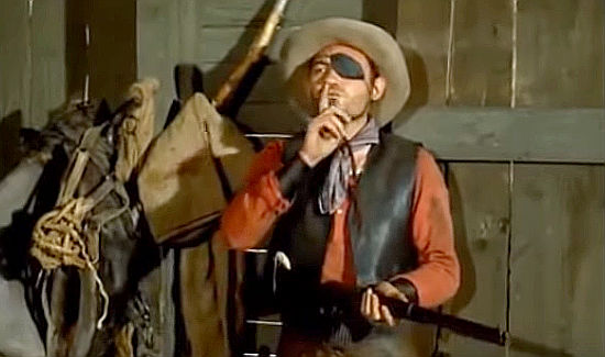 George Lycan as Louis One-Eye, one of Jack's men in Dynamite Jack (1961)