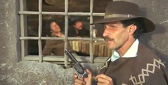 Ciccio Ingrassia as Ciccio, doing his Clint Eastwood imitation in CiccioForgives, I Don't (1968)