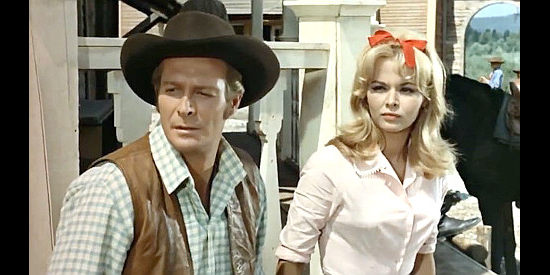 Fred Beir as Clay Stone with Evi Marandi (Evy Marandis) as Estelle in Damned Pistols of Dallas (1964)