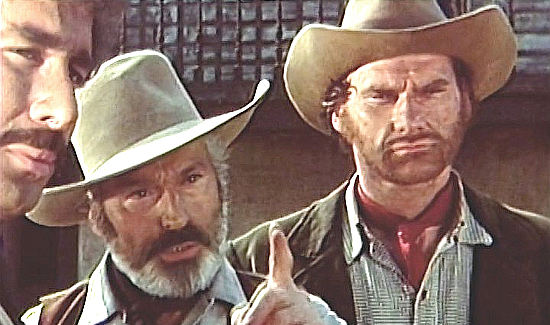 Gianfranco Clerici (Mark Davis) as Shannon, Attilio Dottesio as the sheriff and Donal O'Brien as Lee Rast in Paid in Blood (1971)