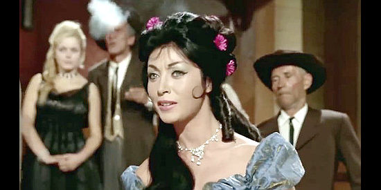 Lucia Bomez as Marilyn, the dance hall singer, in Damned Pistols of Dallas (1964)