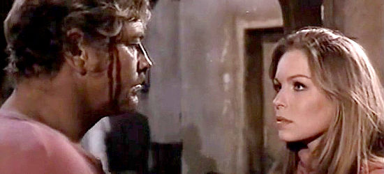 Wayde Preston as Doc Williams with Anna Malsson as his girlfriend in Hey Amigo, You're Dead (1970)