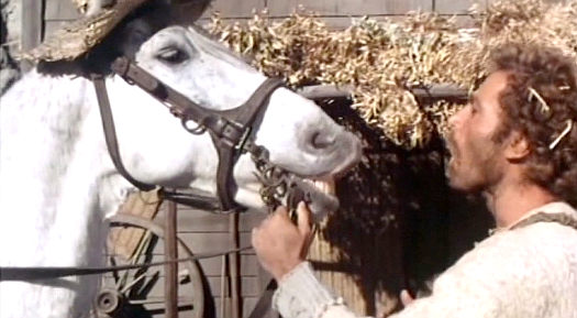 Franco Nero as Onion with his horse Archibald in Cry Onion (1975)