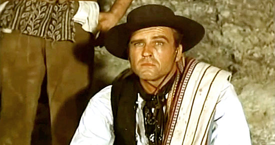 John Ericson as Don Diego Alvarado in Seven for Pancho Villa (1967)