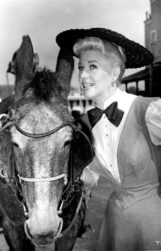 Ginger Rogers as Rose Gilray with her horse in The First Traveling Saleslady (1956)