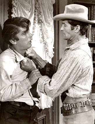 Robert Evans as Felix Griffin with Hugh O'Brian as Daniel Hardy in The Fiend Who Walked the West (1958)